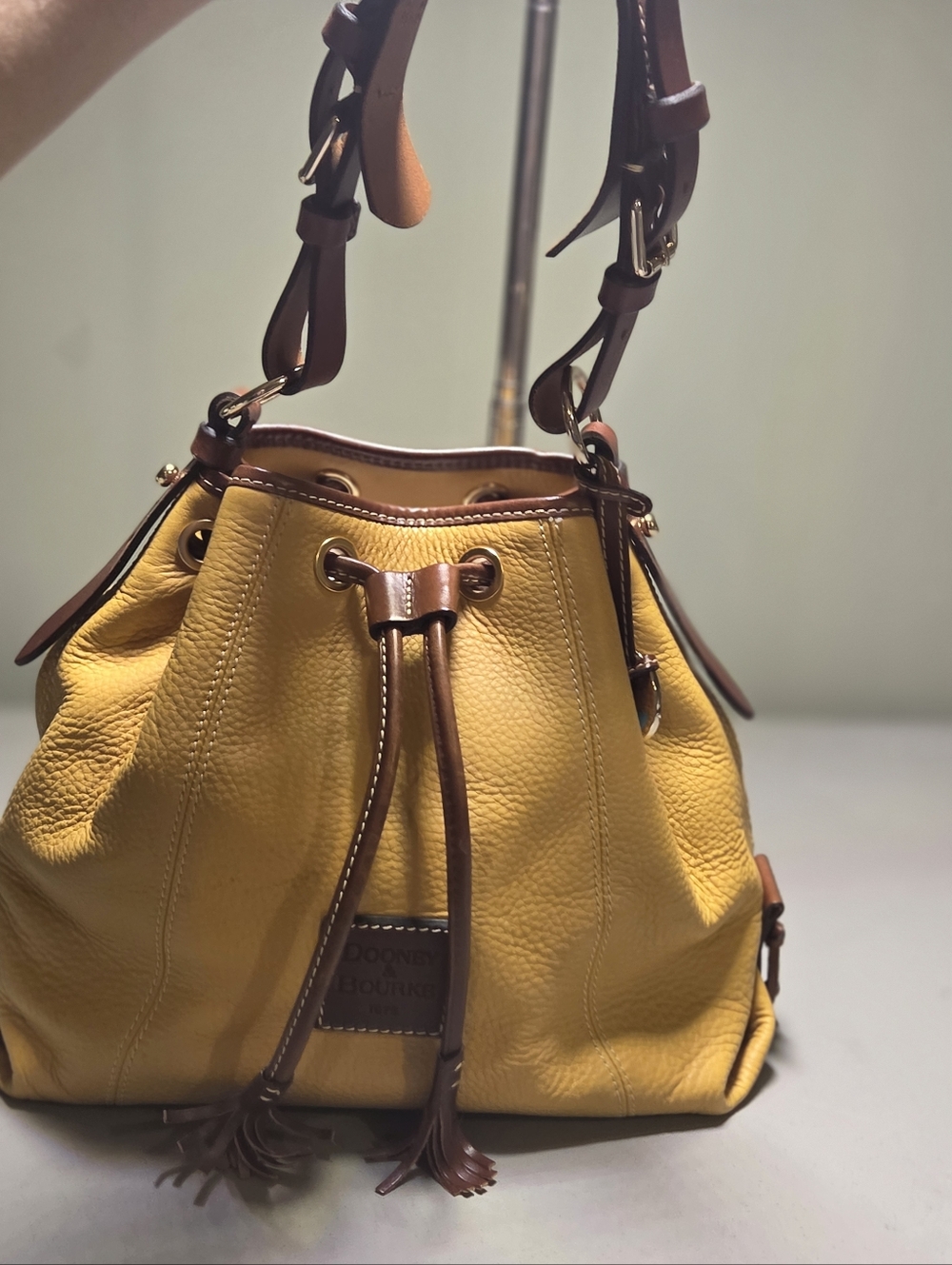 Dooney & Bourke Brown Pebbled Leather Drawstring Bucket Bag